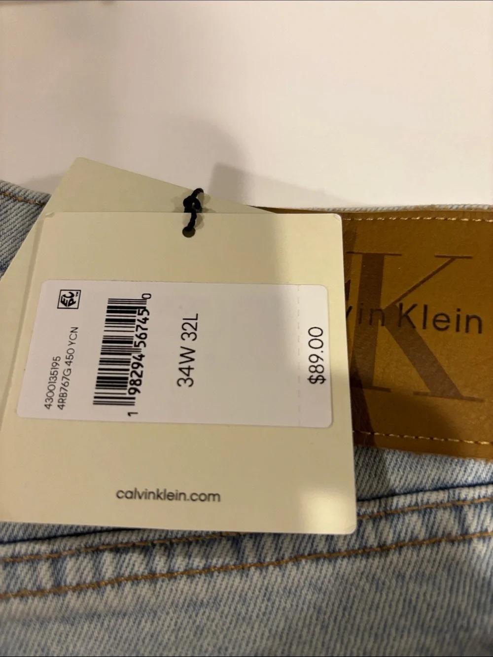 Calvin Klein Light Wash Denim Jeans with Tan Leather Patch - Picture 2 of 10